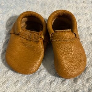 BirdRock Baby tan moccasins size 5.5